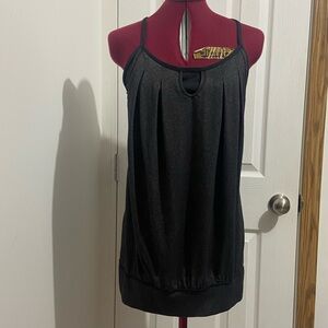 Lululemon women black and grey tone athletic workout top. Size L. Used.